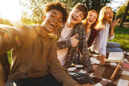 Group of cheerful multhiethnic students